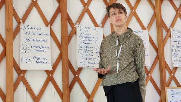 Photo of Elise Knudsons giving a lecture.