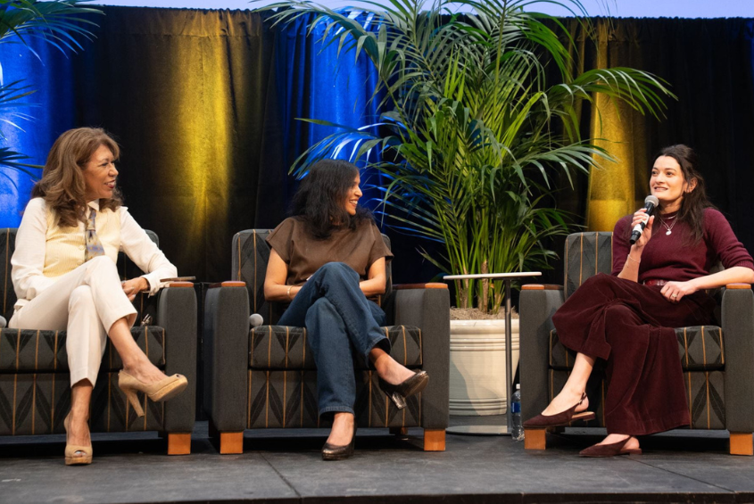 Women sitting in chairs talking